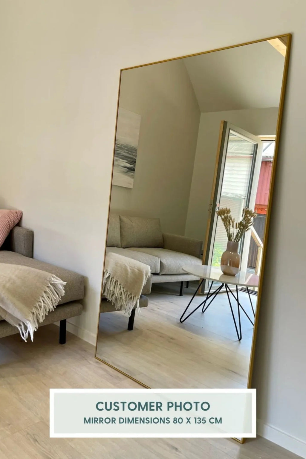 TCL Studios Sleek Full Length Mirror, a modern minimalist rectangular mirror featuring a thin, brushed gold metal frame and clear reflective glass.