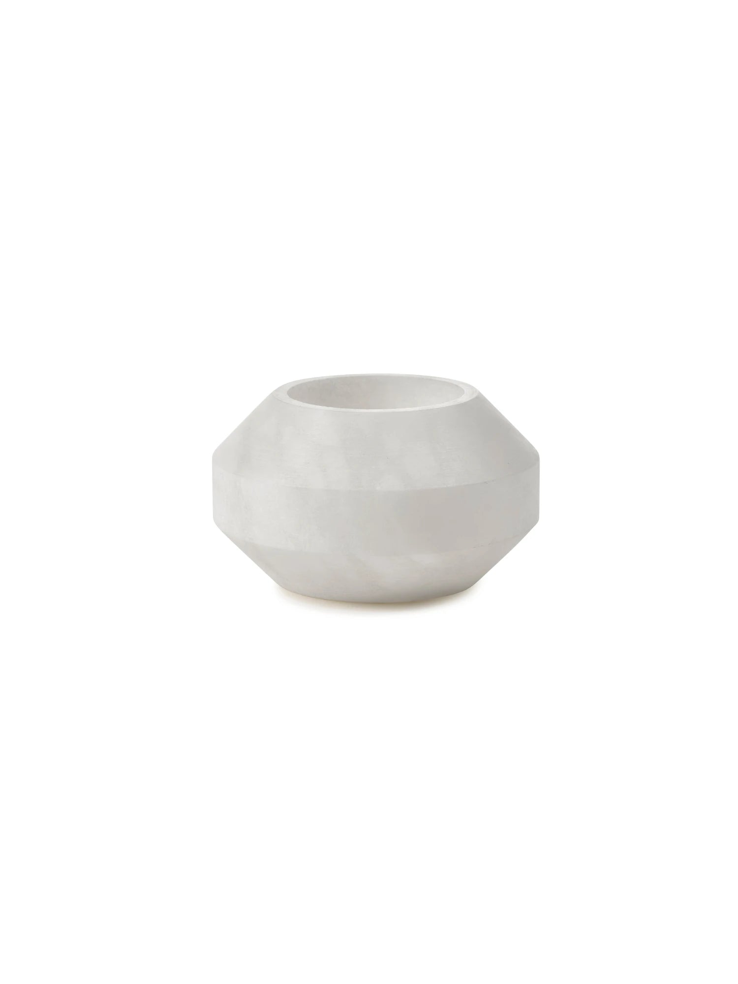 White alabaster candle holder on a white background