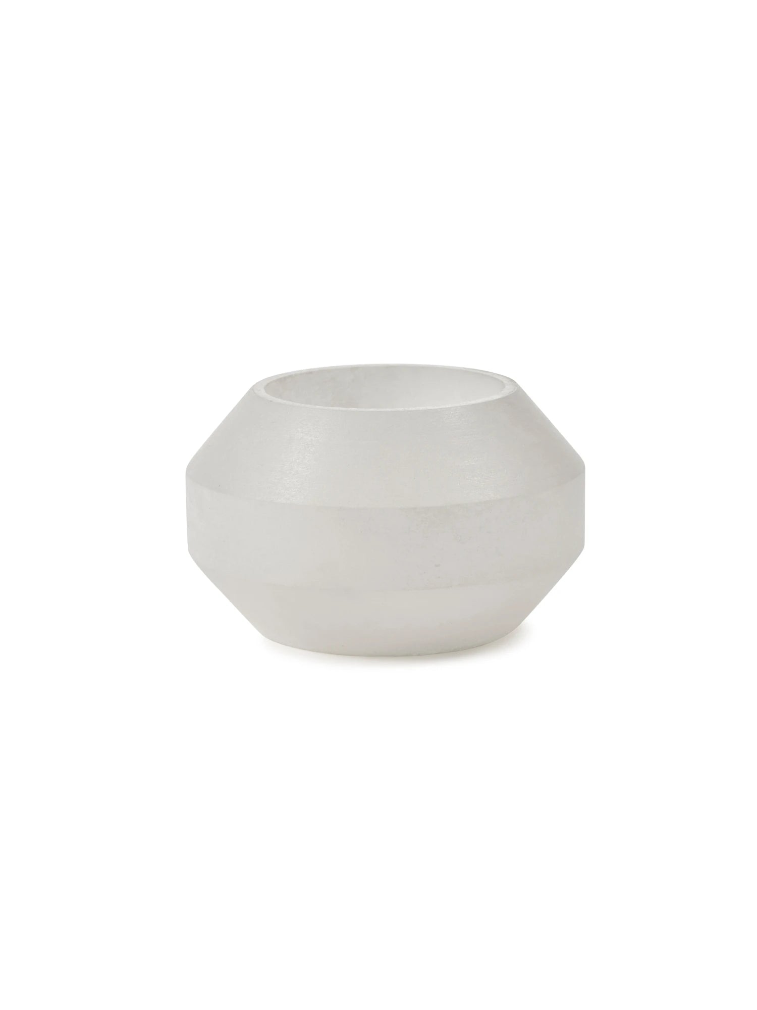 White alabaster candle holder on a white background