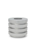 Set of gray steel egg cups stacked on a white background
