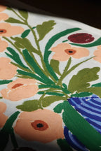 Beautiful blue ceramic vase with a bouquet of fresh flowers