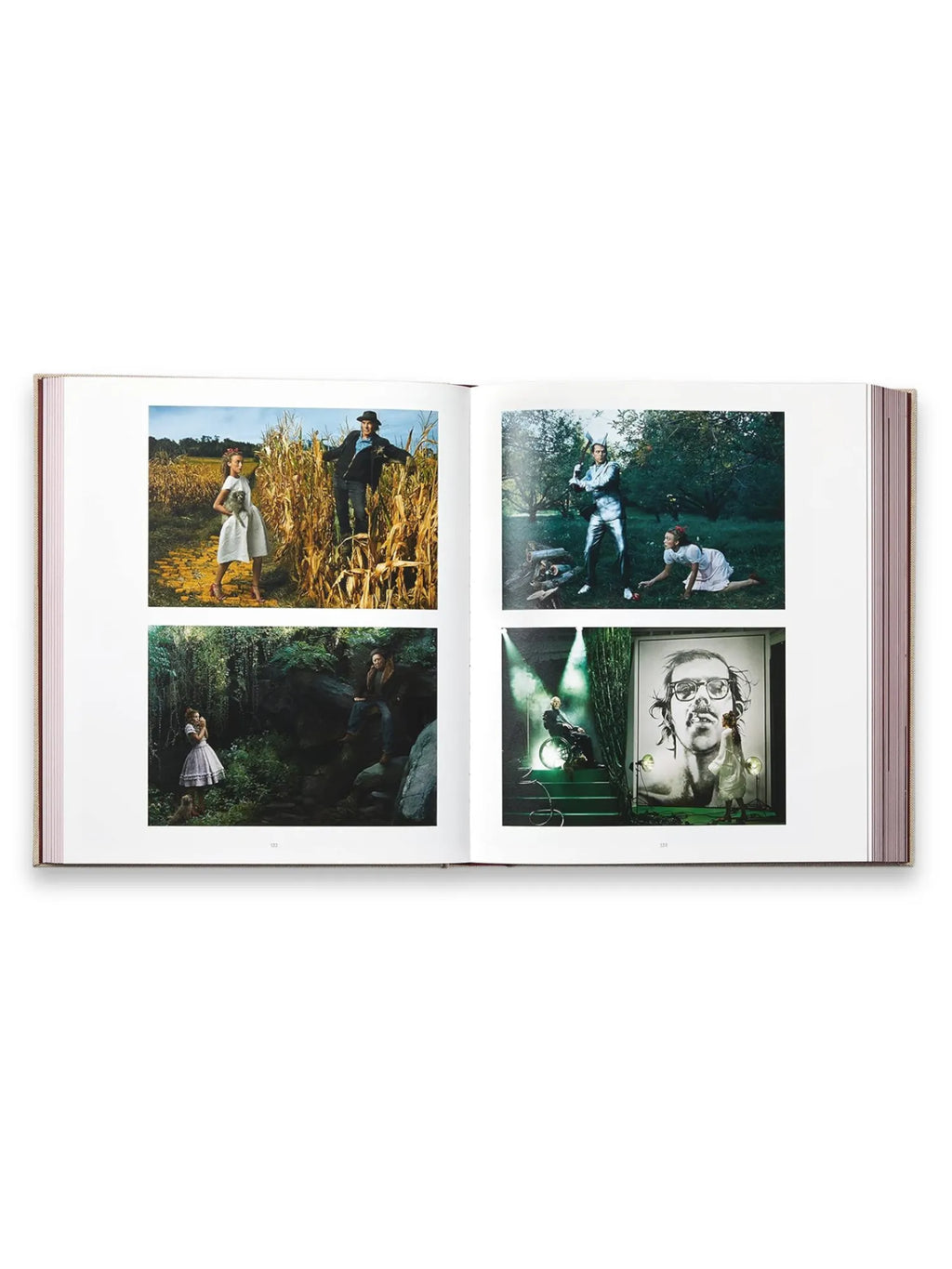 Book Annie Leibovitz’s ‘Wonderland’, an open photography book displaying four vibrant, conceptual images. This premium art book is perfect for photography enthusiasts and collectors seeking iconic visual storytelling.