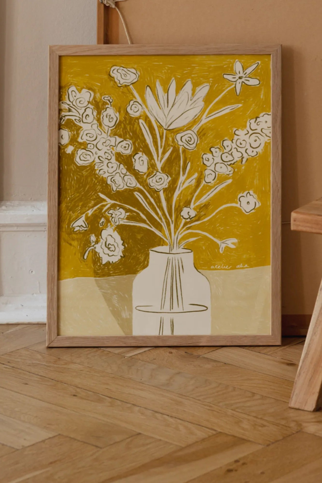 Close-up of a yellow bouquet with greenery and baby's breath