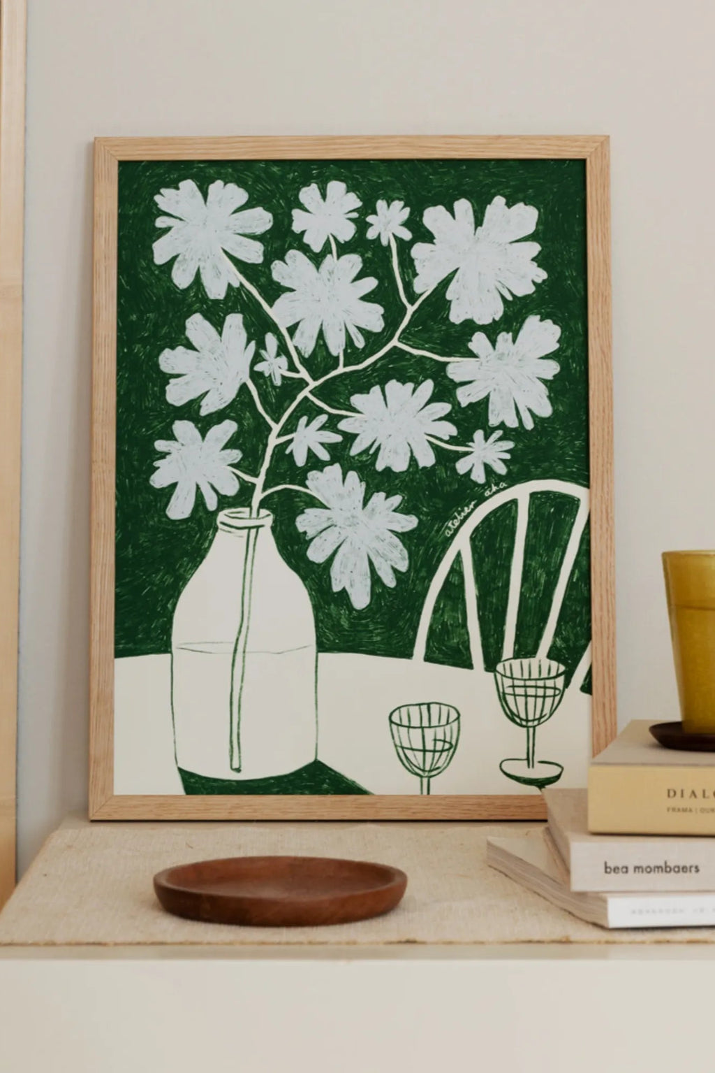 A beautiful arrangement of vibrant blue flowers next to a bottle of rich, red wine