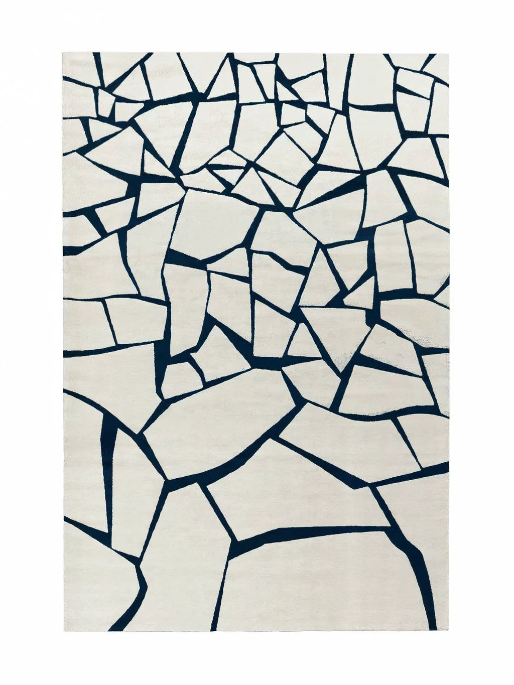alp_ Arctic Rug, a modern abstract rug featuring a striking geometric shattered pattern of sharp dark navy lines against a creamy off-white background, creating a bold, contemporary design.