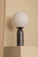 Spherical table light on a beige background