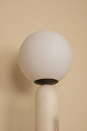 Spherical table light on a beige background