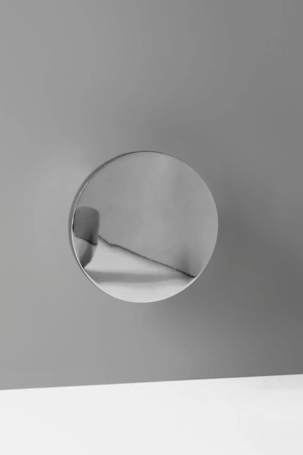 Beautiful round gold frame Aura Wall Mirror reflects light and enhances space