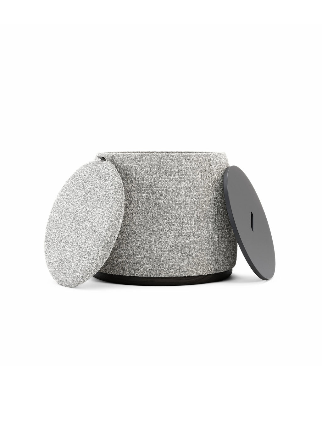Domkapa Avery Pouf, a modern grey upholstered storage pouf featuring a textured light grey melange fabric on a cylindrical body with a dark wood base. It includes two versatile round lids: one upholstered in matching fabric, and another in a sleek matte dark grey finish, offering multi-functional seating or concealed storage. Perfect as a contemporary living room accent or a stylish bedroom ottoman.