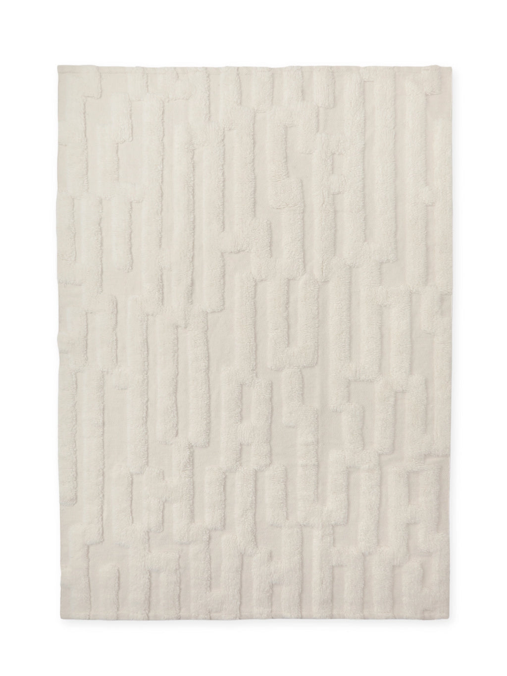 Tinted Objects Bielke Wool Rug, featuring a plush, off-white cream pile with a subtle raised geometric pattern in a soft ivory hue. This luxurious wool rug offers depth and texture. It's perfect for adding warmth and sophisticated style to modern living rooms or cozy bedrooms for discerning homeowners seeking elegant home decor.