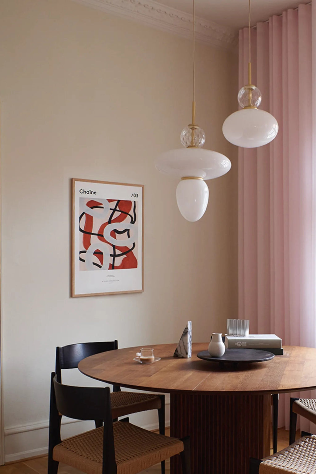 The Poster Club Chaine, a captivating modern abstract art print showcasing bold red and black organic, flowing lines intertwined with soft white shapes against a subtle light beige background, presented in a sleek natural oak frame. This contemporary poster is ideal for creating a focal point on gallery walls or adding minimalist sophistication to a modern dining room or living space.
