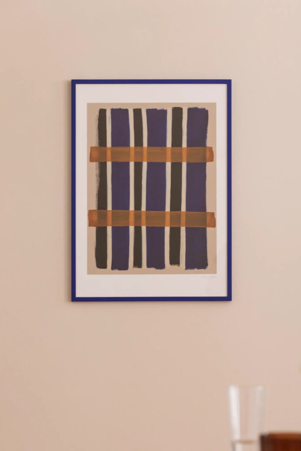 The Poster Club Checkered, an abstract art print featuring a bold grid pattern of deep purple and dark grey vertical brushstrokes intersected by two horizontal burnt orange lines, set against a warm beige background. This contemporary poster is presented in a vibrant royal blue frame with a crisp white mat. Perfect as modern wall art for a living room, bedroom accent, or a colorful addition to a gallery wall.