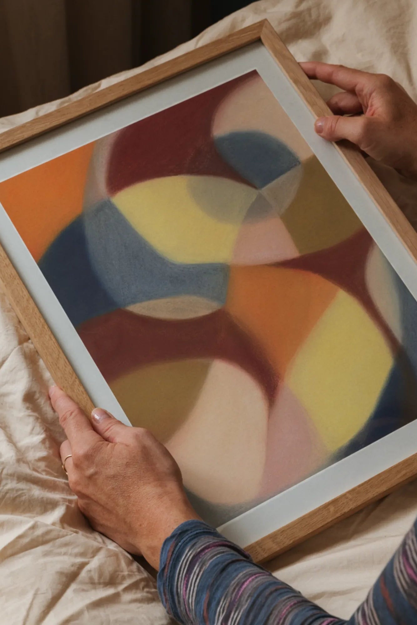 Close-up of a lustrous single pearl on a silver chain necklace