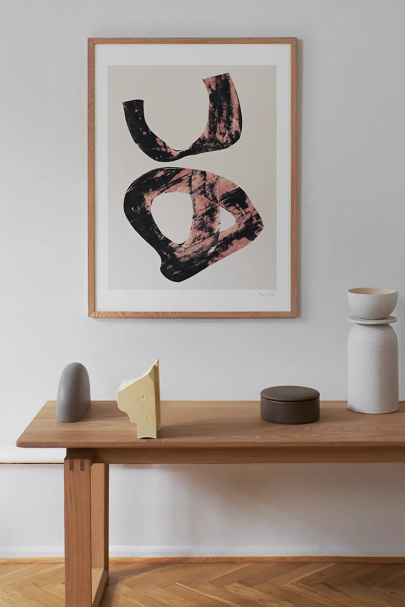 Close-up view of a painted papercut showing the fine details and delicate cutwork