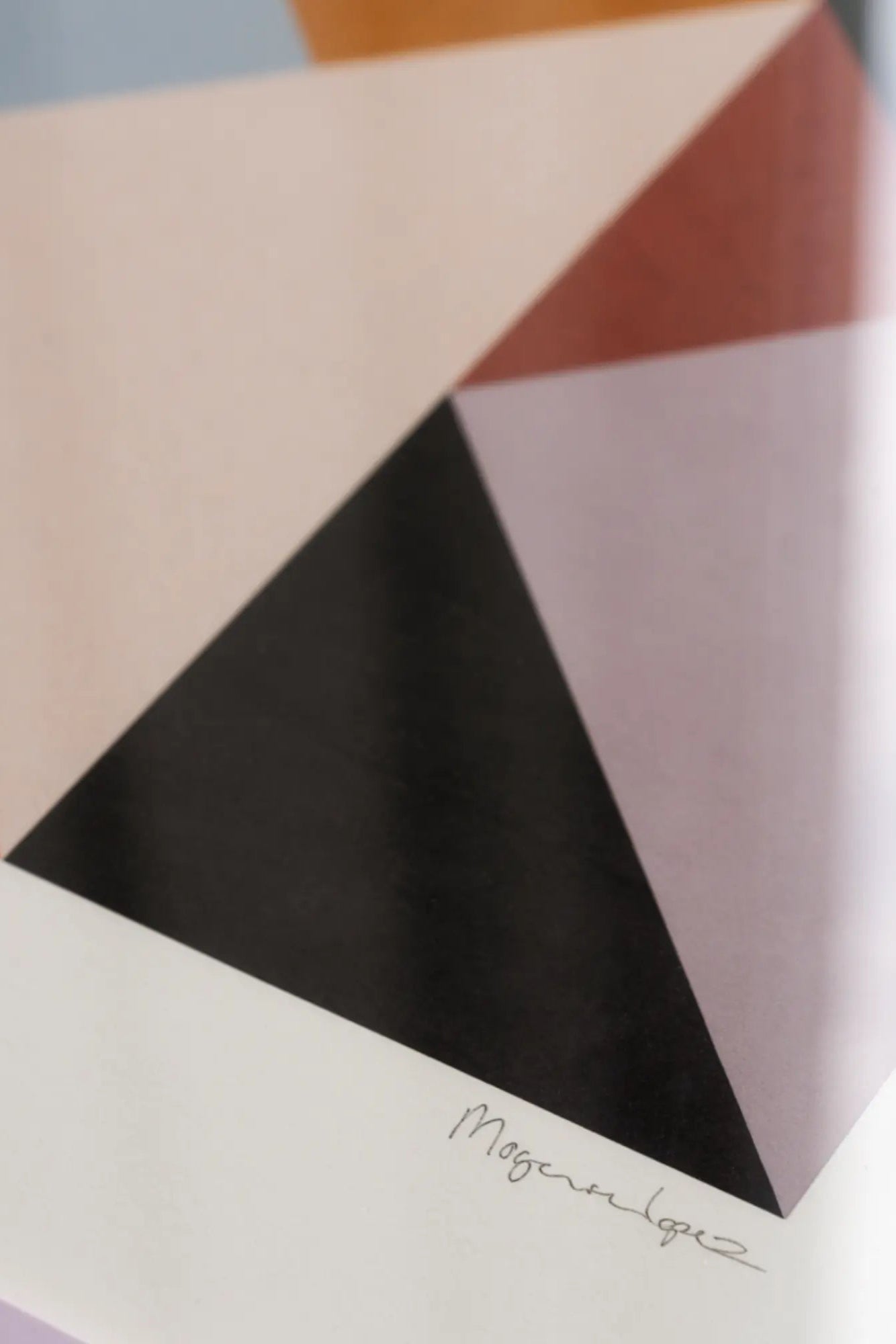 Contemporary artwork showcasing the rhythmic movement of colorful triangles