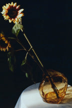 A close-up image of the A STUDY 001 Blæhr Vase - Large, showcasing its elegant and intricate design with a smooth, cylindrical shape and a unique, textured surface