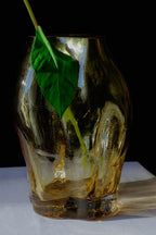 A close-up of the small Blæhr Vase from the A STUDY 001 collection, showcasing its unique handcrafted design and beautiful blue hue