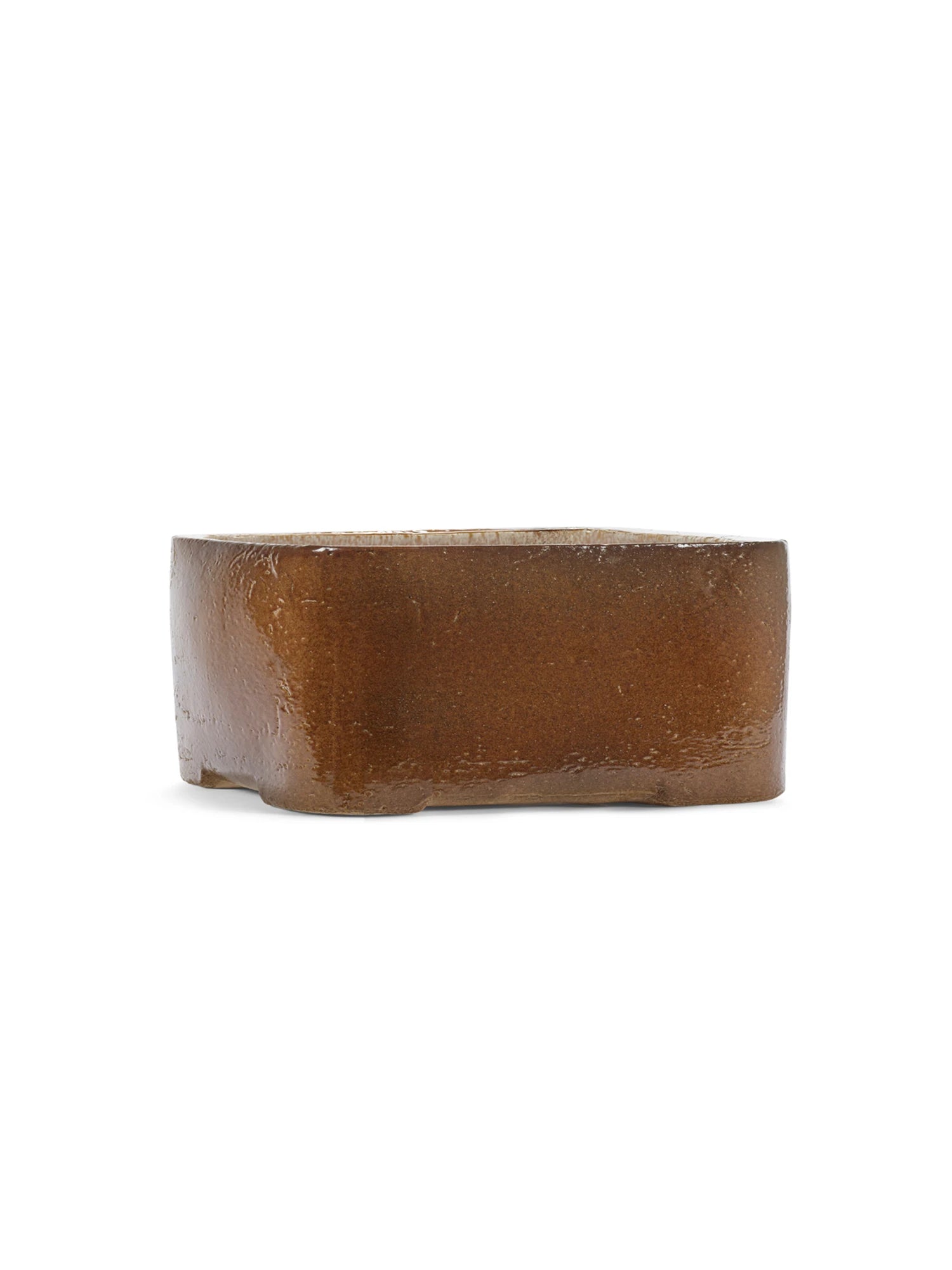 Brown rectangular bar of soap on a white background