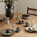 Dinner set for 4, featuring a stunning sea-blue glaze and minimalist yet timeless design