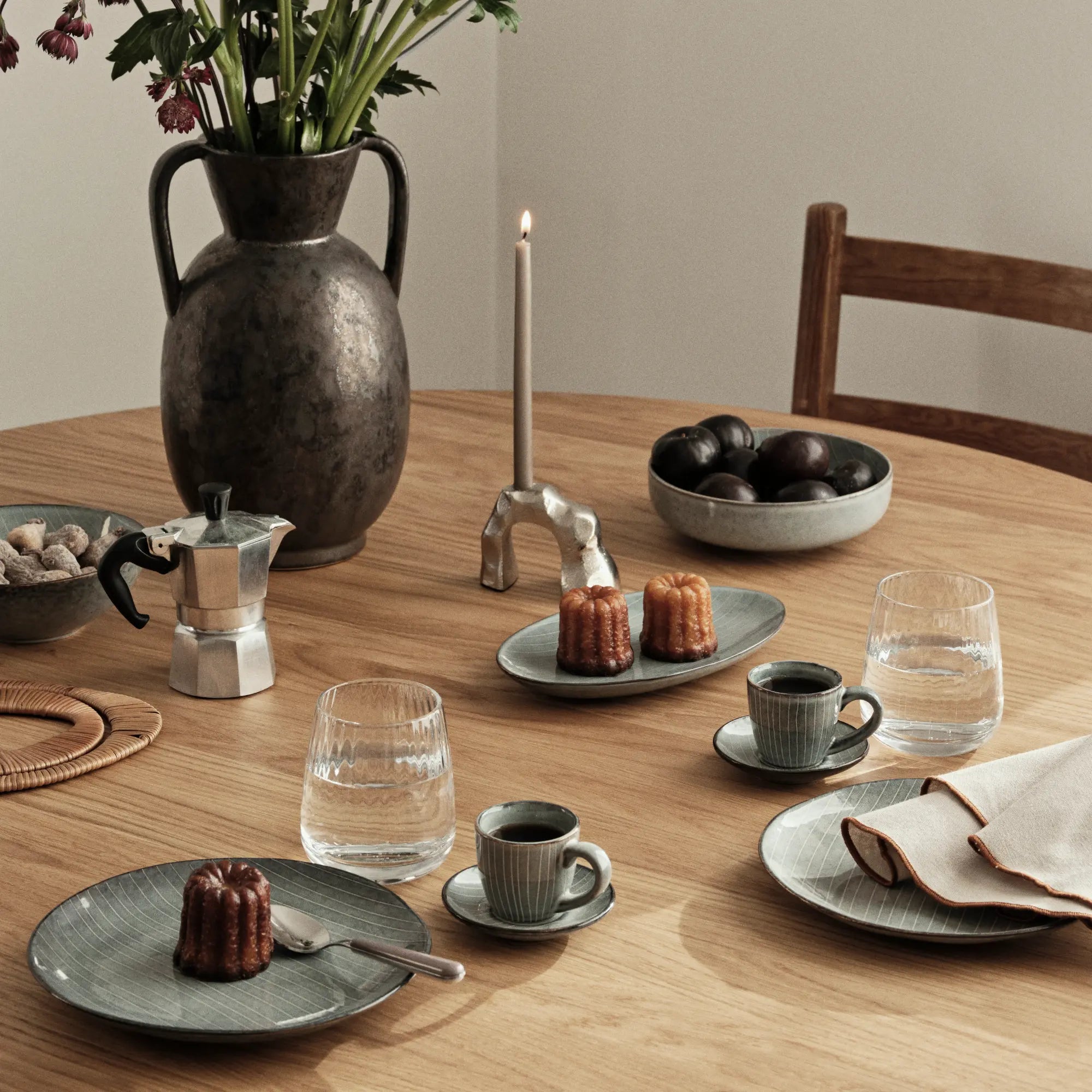 Dinner set for 4, featuring a stunning sea-blue glaze and minimalist yet timeless design