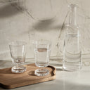 Elegant Bubble Carafe with Lid, a durable glass pitcher with a secure lid and comfortable handle, ideal for serving drinks at parties or gatherings