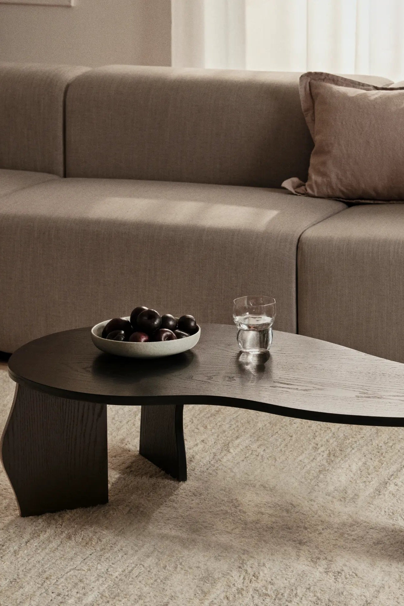  Large rectangular wooden table with sturdy legs and elegant craftsmanship