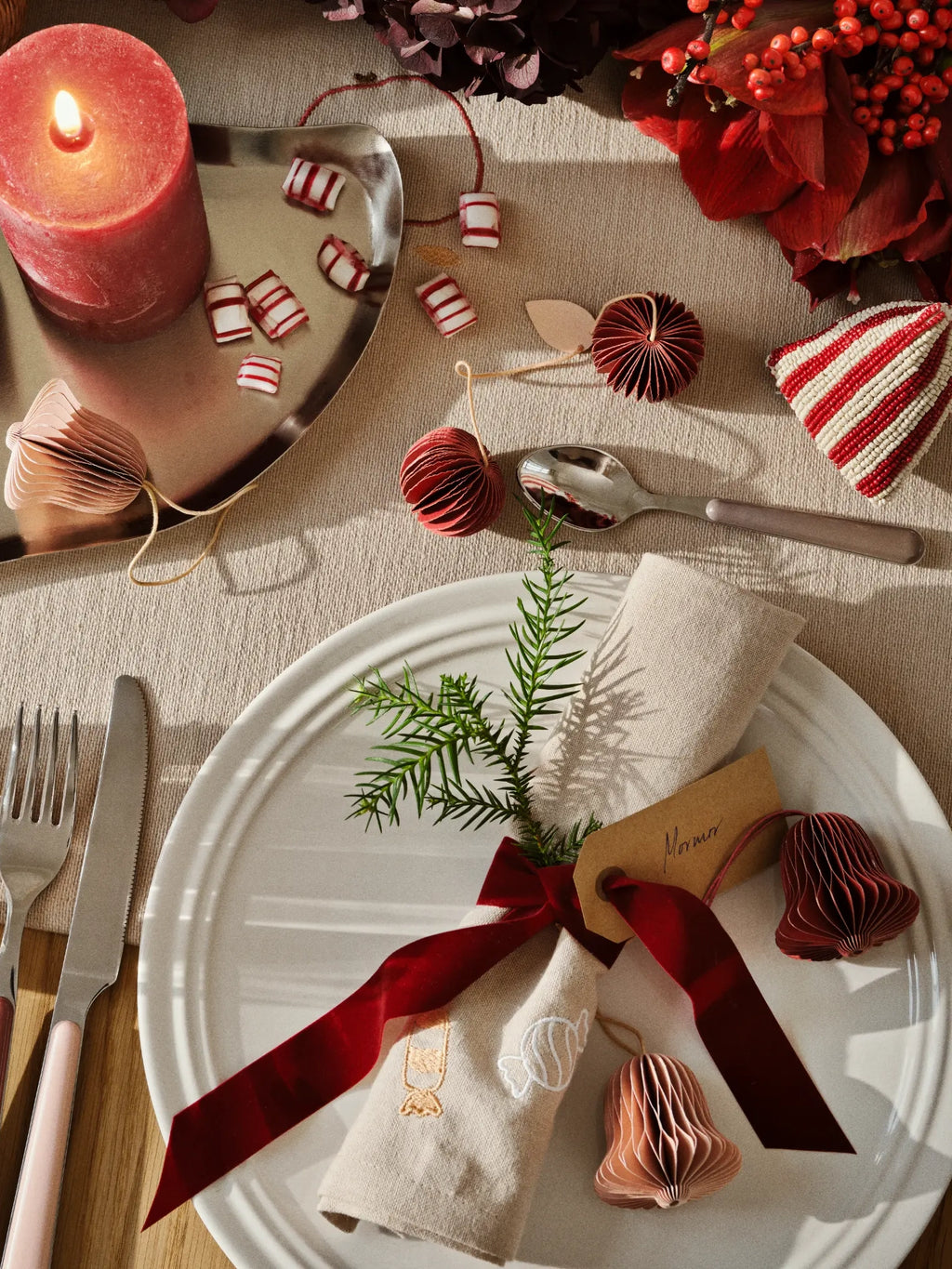 Broste Copenhagen Stevns Dinner Set for 4, a minimalist ceramic dinnerware set featuring four round dinner plates in a natural off-white or light beige matte stoneware finish with a subtly raised, organic rim. These Scandinavian-inspired ceramic plates offer a rustic chic aesthetic, perfect for everyday use or special occasion dining table settings in organic modern homes.
