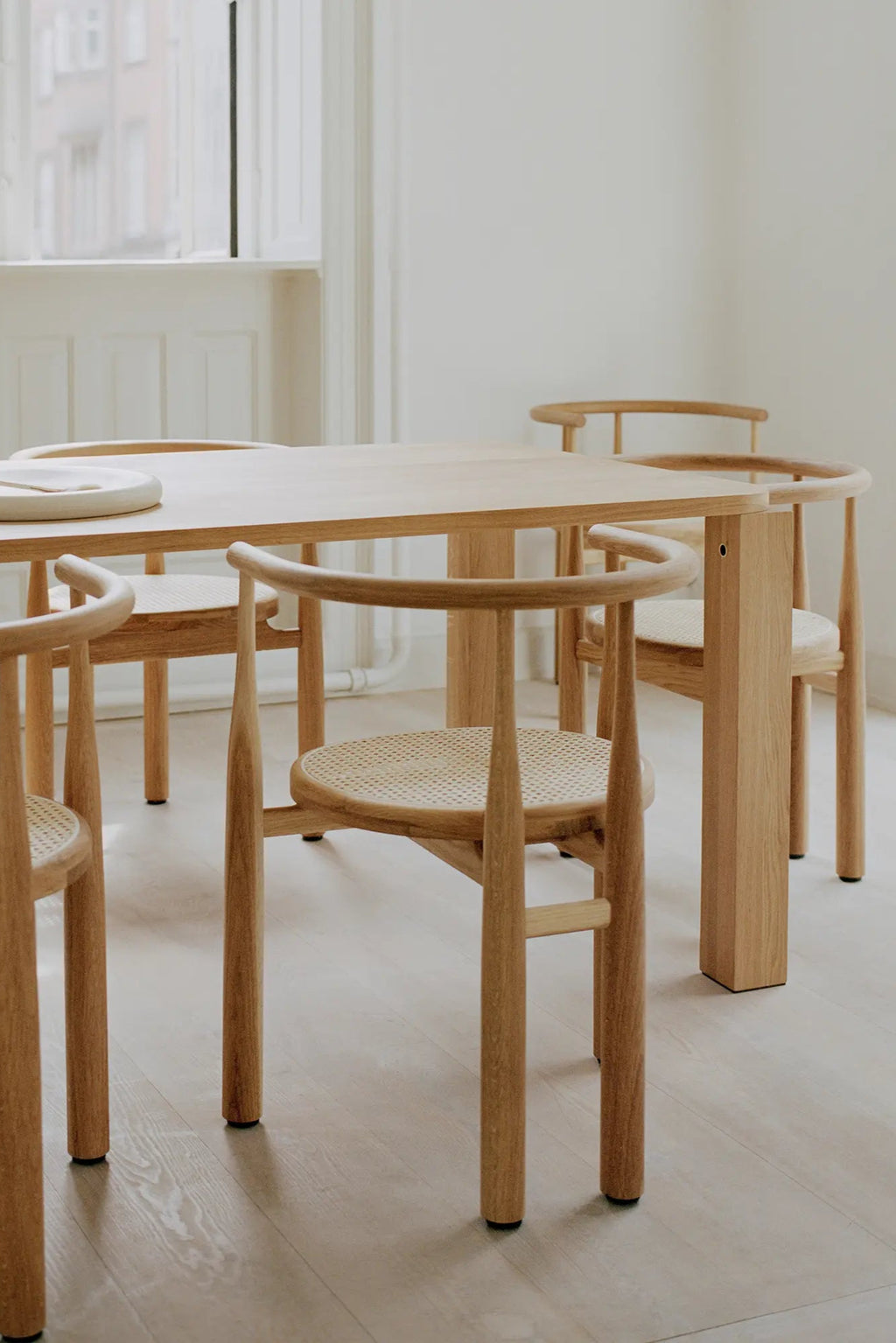 Elegant Bukowski Dining Chair - French Cane in natural wood finish