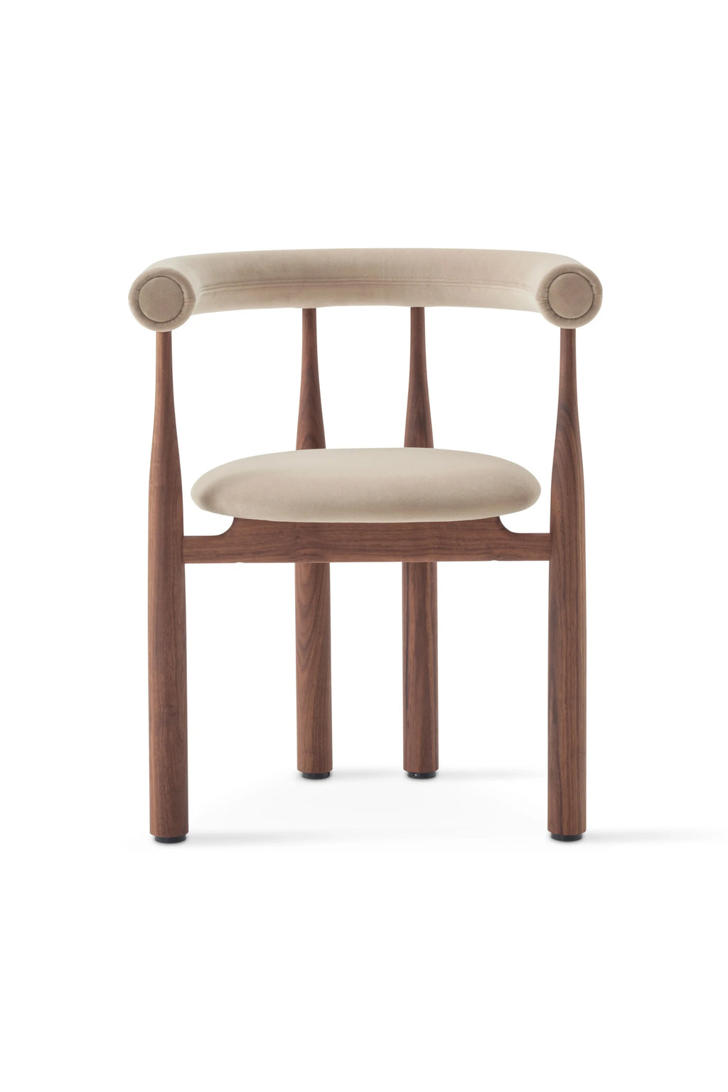New Works Upholstered Bukowski Dining Chair, shown front-on with a light beige fabric seat and curved backrest, on a solid walnut wooden frame with distinctive tapered legs. A premium, modern furniture piece.