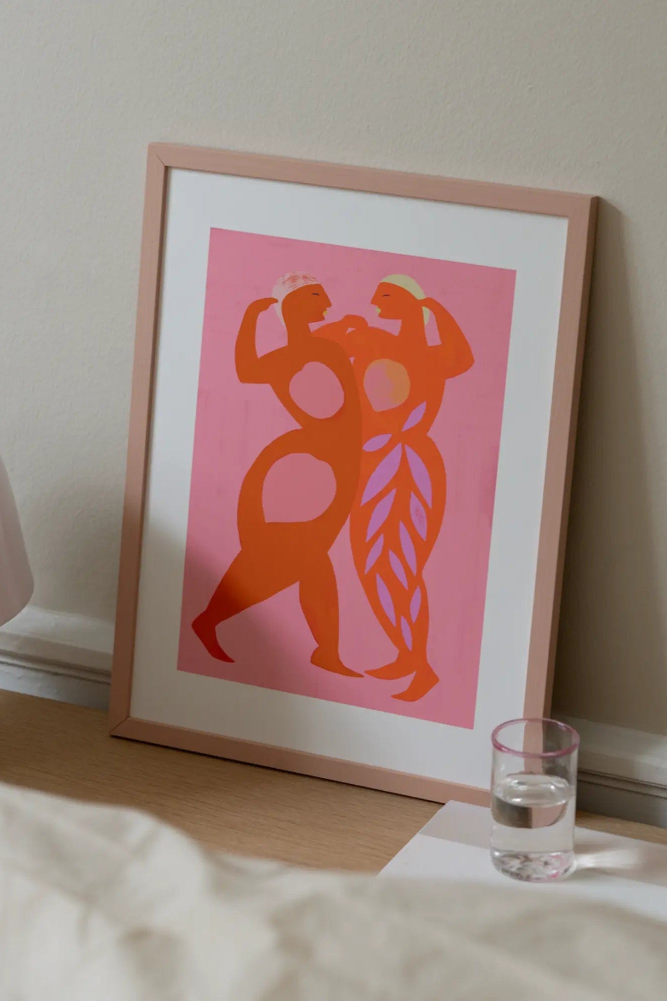 Sisterhood: A close-up image of three women of different ethnicities holding hands and standing in solidarity