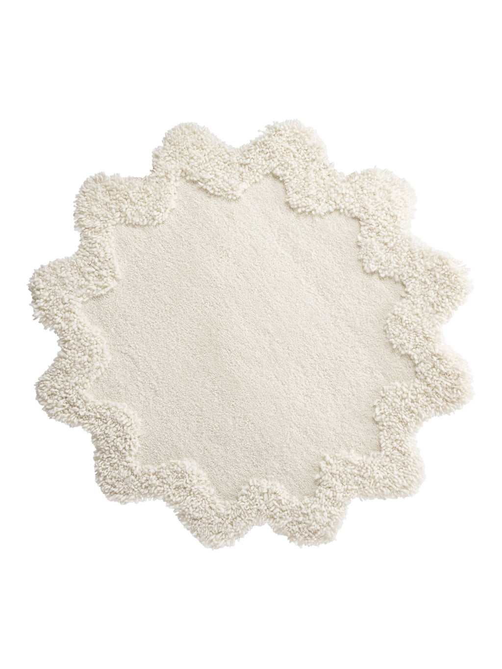 Cappelen Dimyr Snowflake, a luxurious cream-colored hand-tufted wool rug featuring an irregular scalloped shape with a plush shaggy border and a softer, dense pile center, creating a unique two-pile height design. This textured off-white area rug brings a cozy, organic modern aesthetic to bedrooms, nurseries, or living rooms.