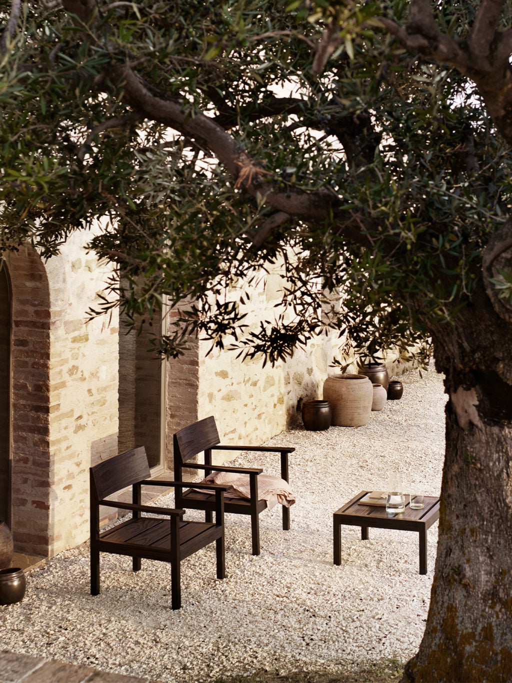 Tine K Outdoor Accoya Pinewood Side Table, a modern minimalist outdoor side table crafted from durable Accoya pinewood with a rich dark brown finish, featuring a clean square top and straight, sturdy legs. This weather-resistant patio table is ideal for contemporary outdoor living spaces, gardens, or Mediterranean-inspired terraces.