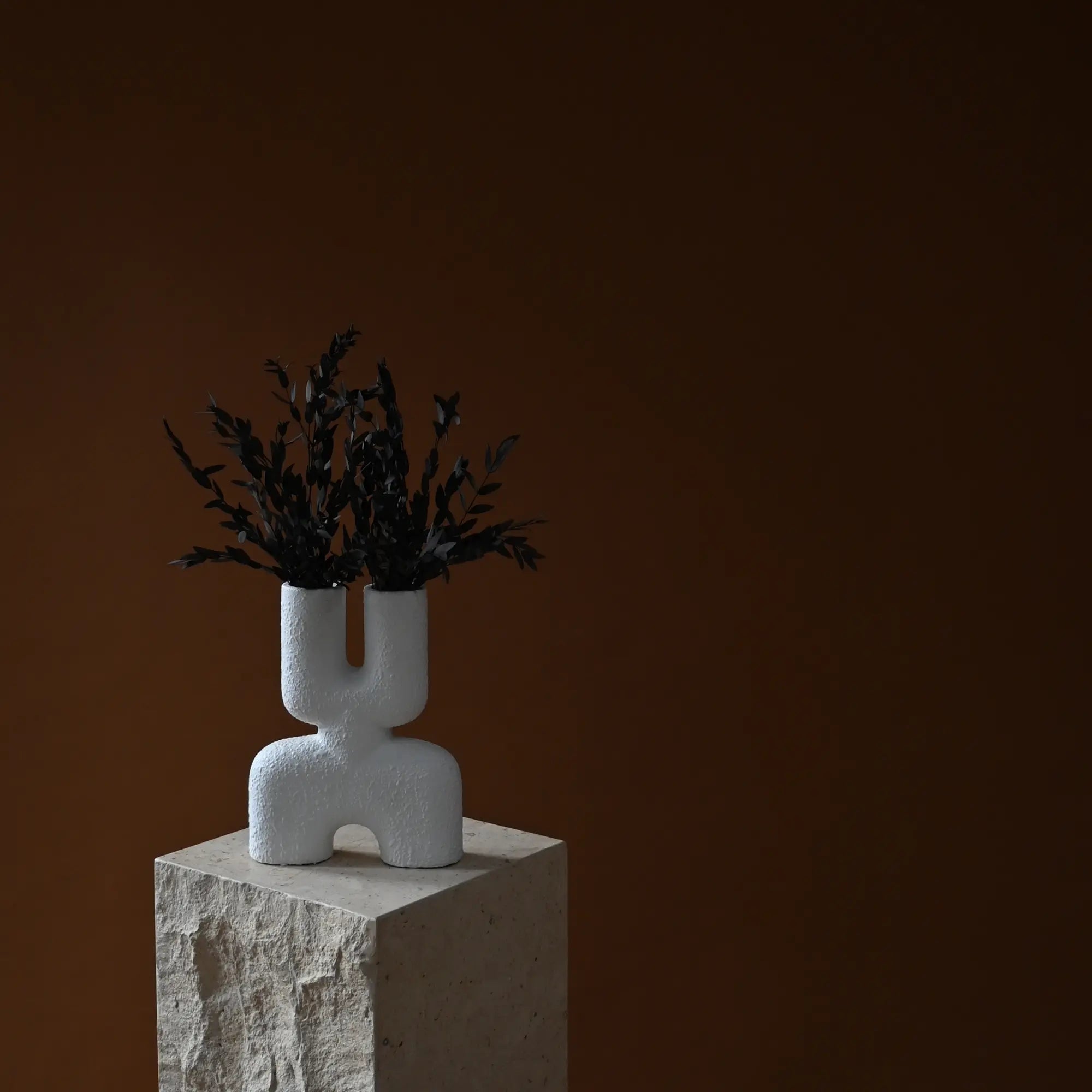 Handcrafted ceramic mini double cobra vase with intricate detailing and glossy finish