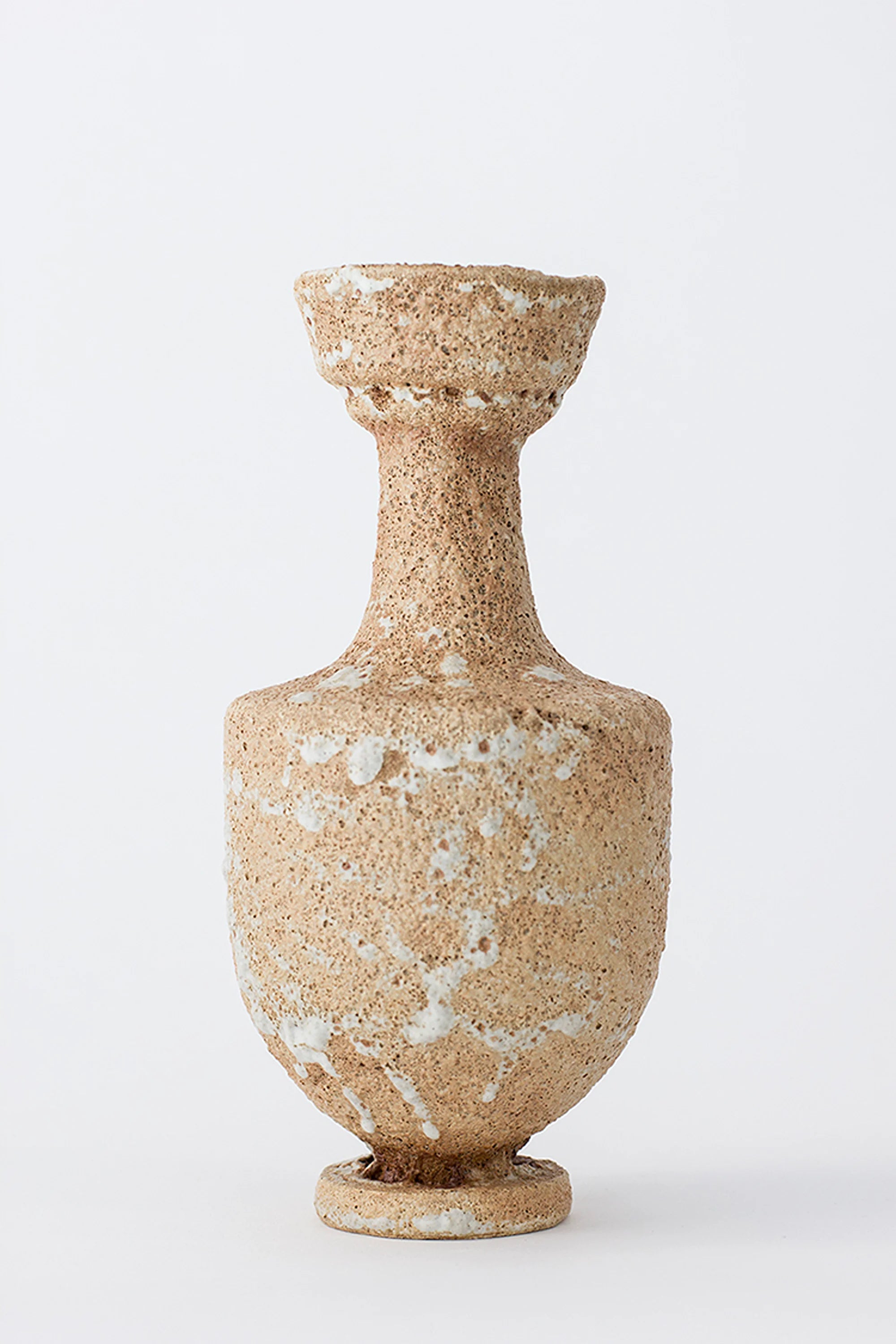 Decorative vase with a textured surface on a white background