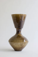 Brown ceramic vase on a white background