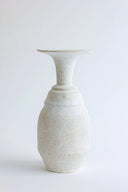 White ceramic vase on a white background
