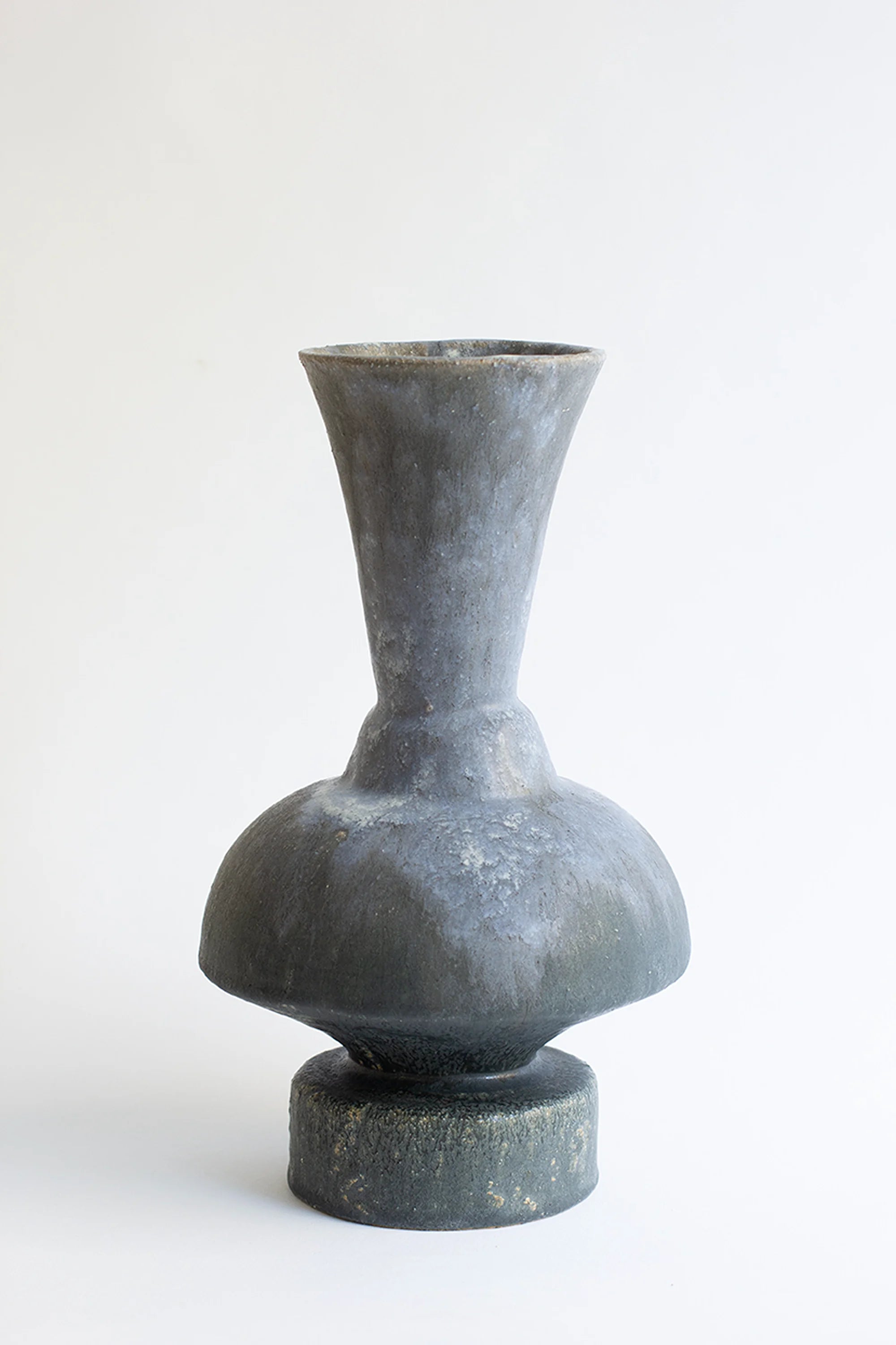Gray ceramic vase on a white background