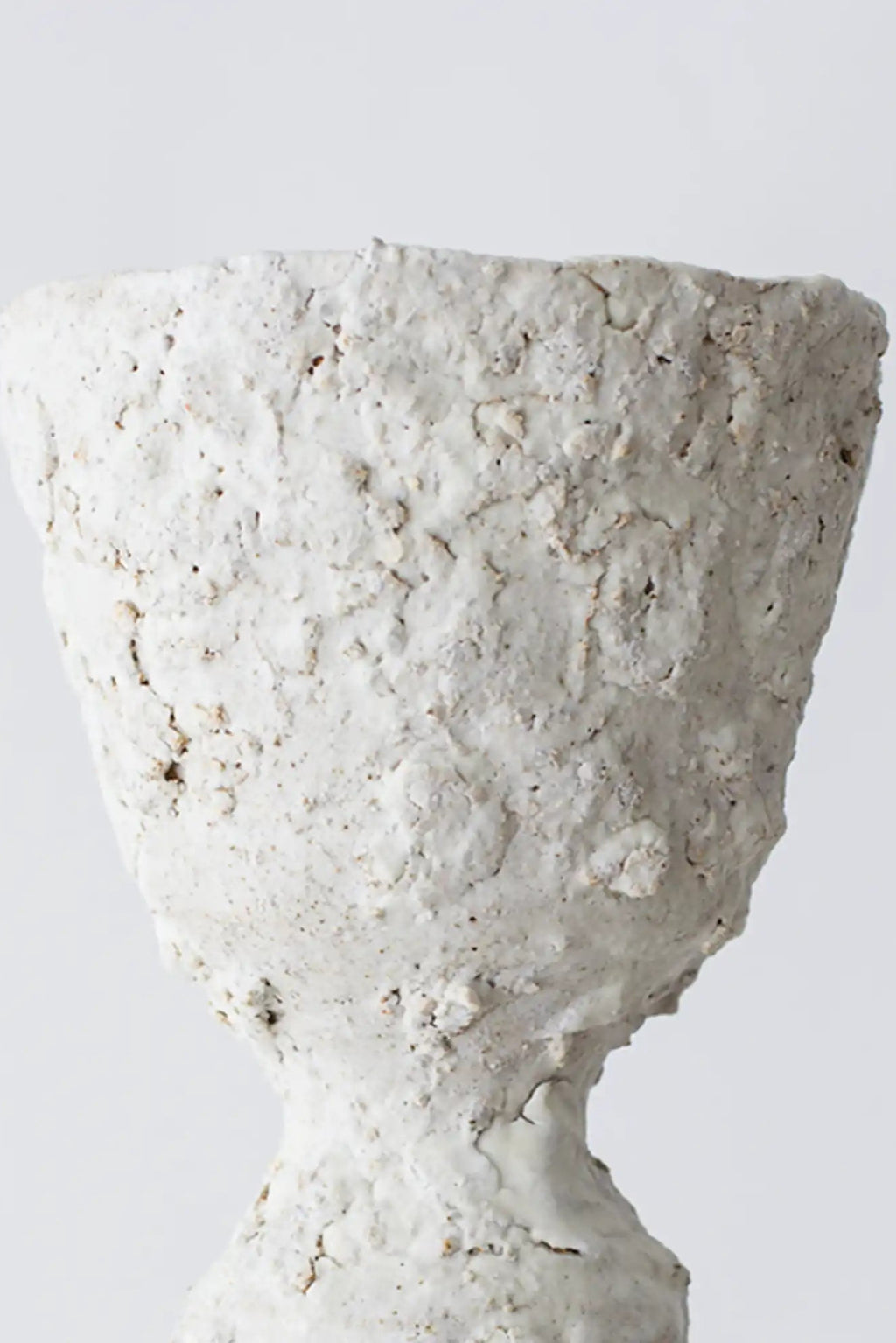 Canoa Lab Isolated n.21 Vase, a handcrafted organic modern ceramic vase in a natural off-white hue with an intensely textured, raw, and porous finish.