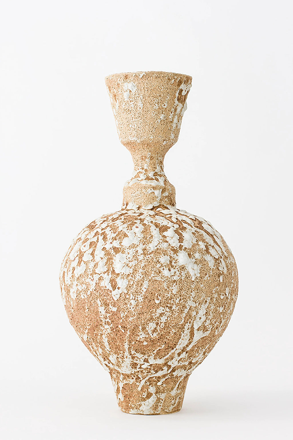 Canoa Lab Isolated n.25 Vase, a unique, organic-shaped ceramic vase with a textured brown base and prominent white glaze patterns, displayed on a clean white background.