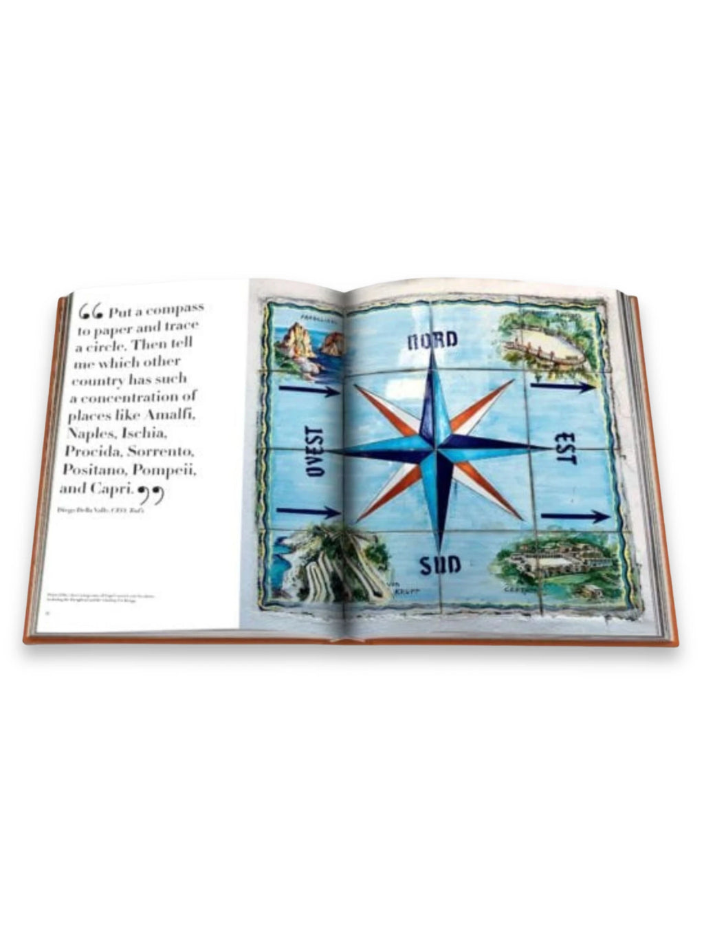 Book Capri Dolce Vita, an open hardcover book displaying a vibrant blue and orange compass rose illustration on a light blue tiled background, with Italian place names visible. This beautiful coffee table book is perfect for travel enthusiasts and those dreaming of Italian getaways.