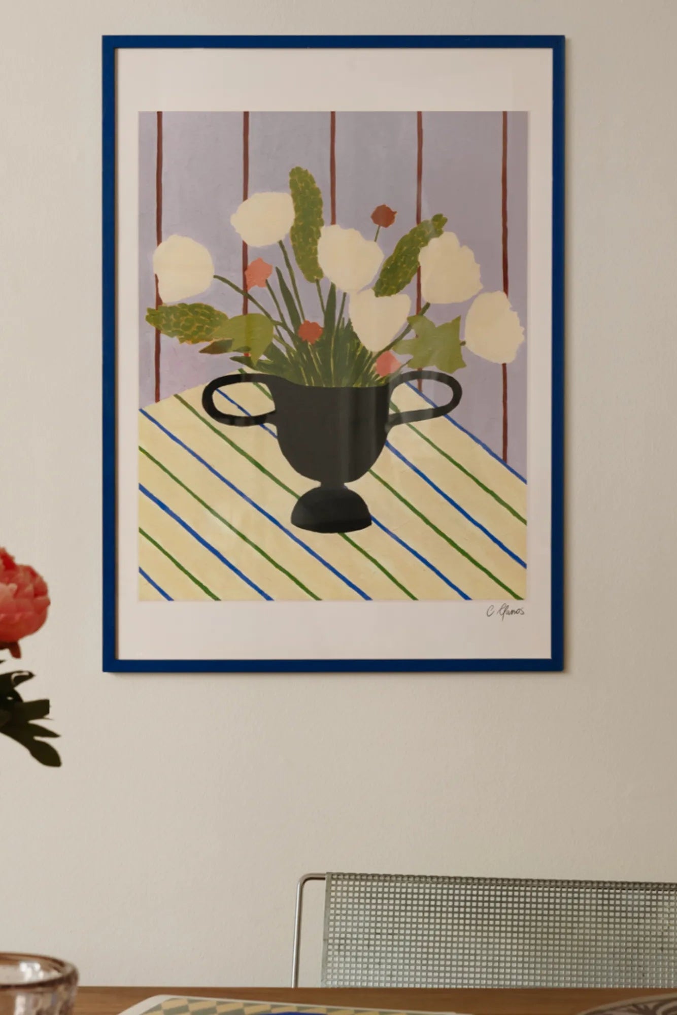 Beautiful floral arrangement on a blue and white striped fabric