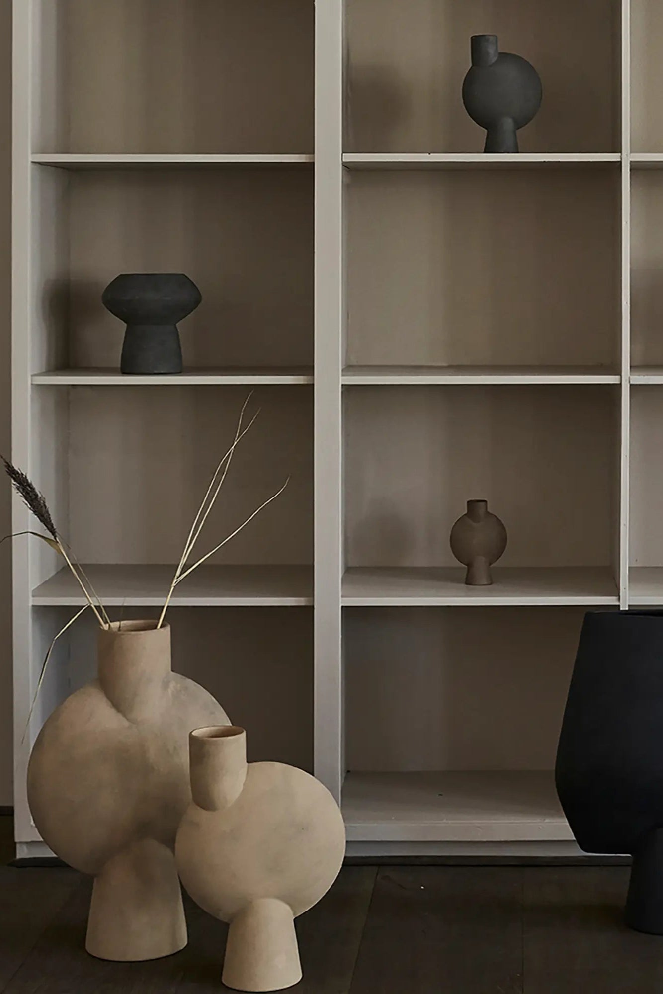 Handcrafted ceramic fat sphere vase with matte finish and unique texture