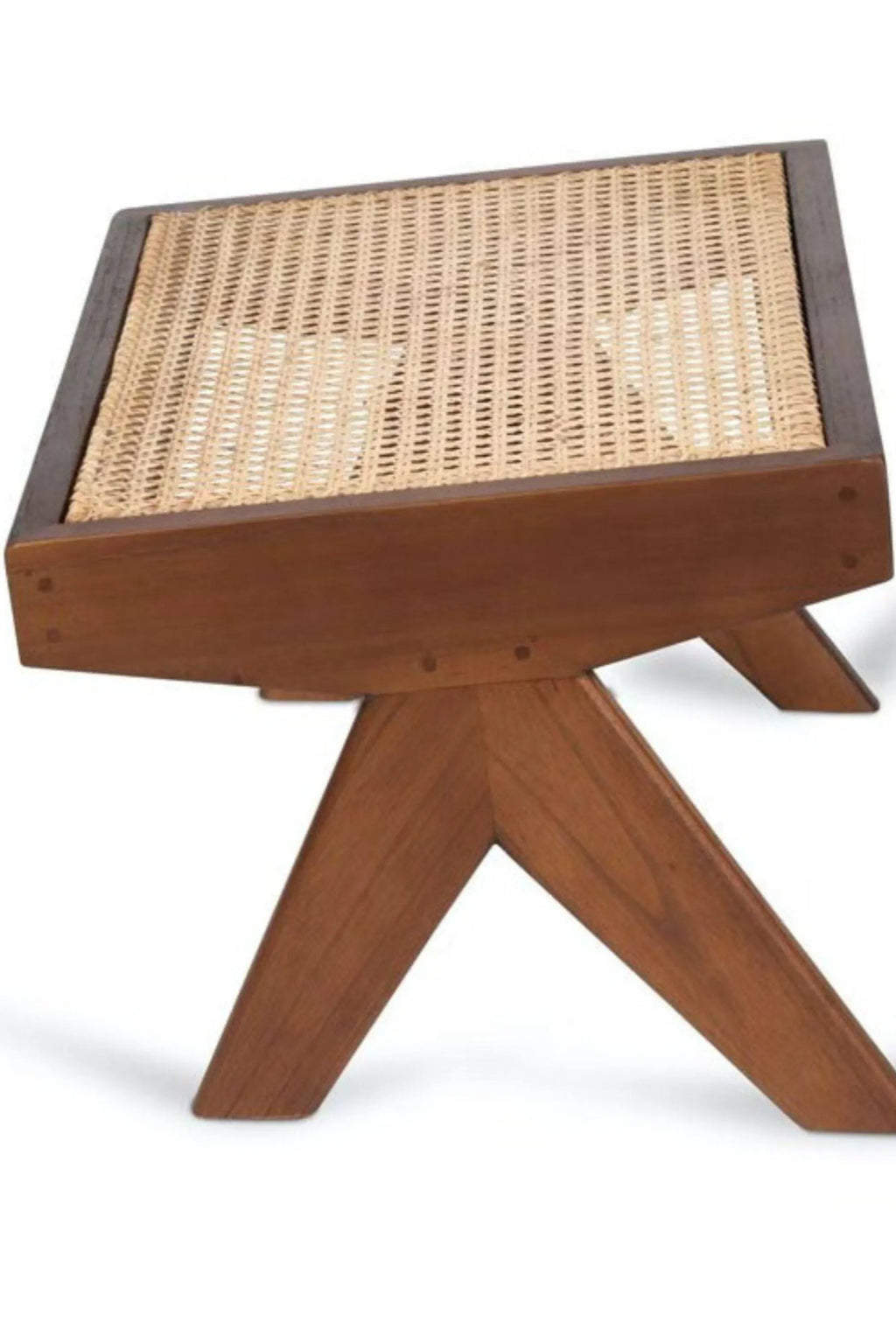 Detjer Chandigarh Kangaroo Footstool, a modern, stylish stool featuring a warm walnut wood frame and a natural woven rattan seat. This elegant piece is perfect for adding a touch of handcrafted texture and premium comfort to any living space.