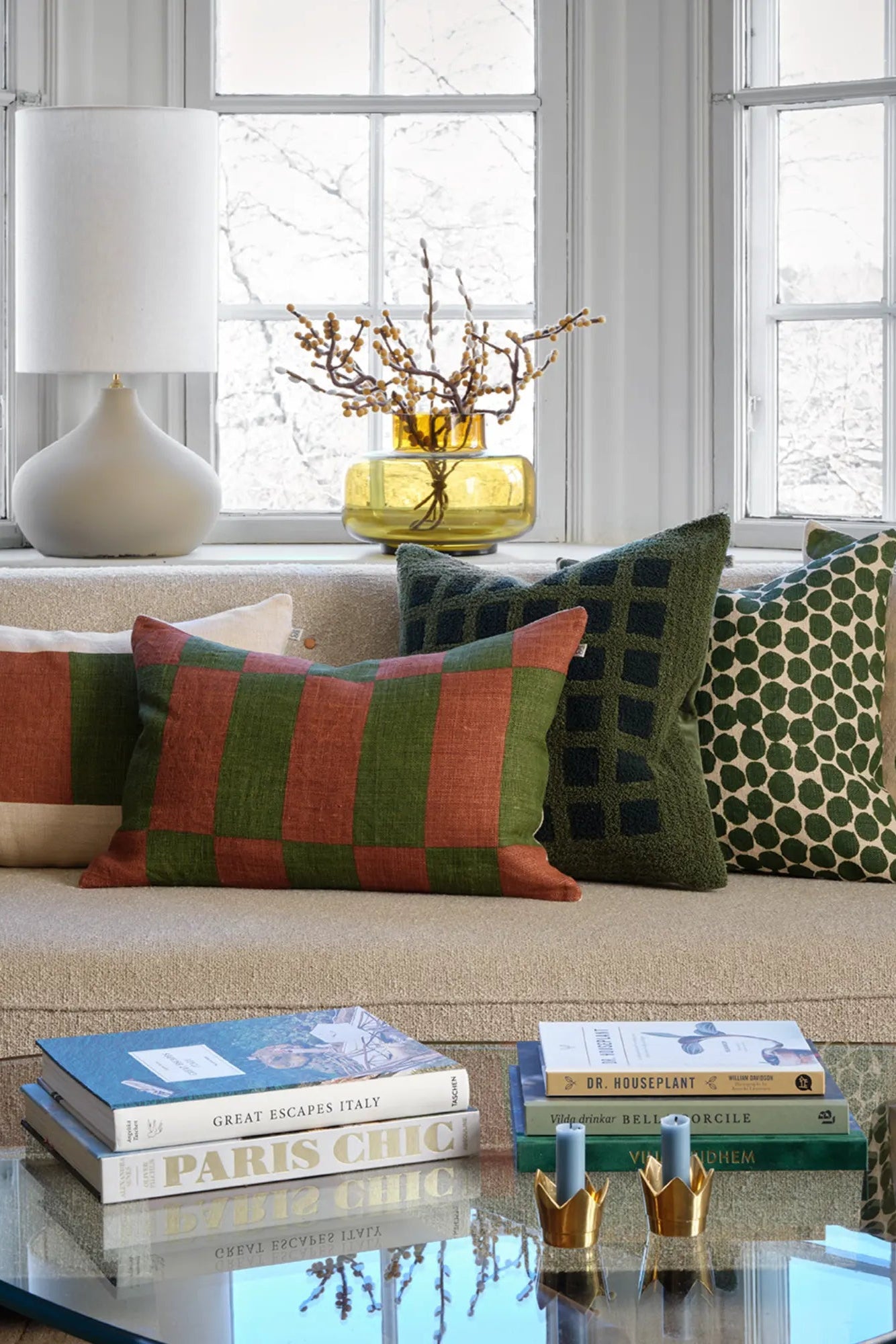 Samar Linen Cushion in soft beige color with intricate embroidery detail and tassels 