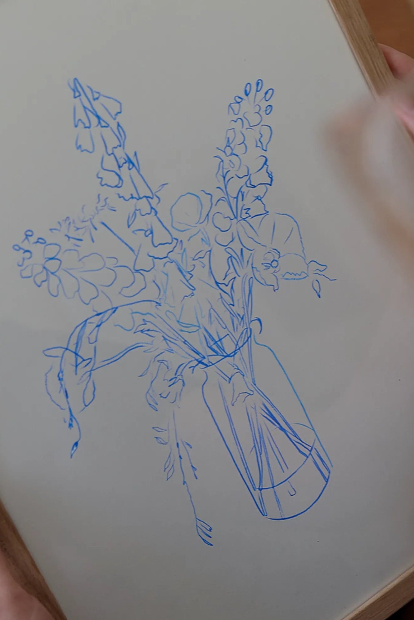 Close-up of a pink and white peony flower with water droplets