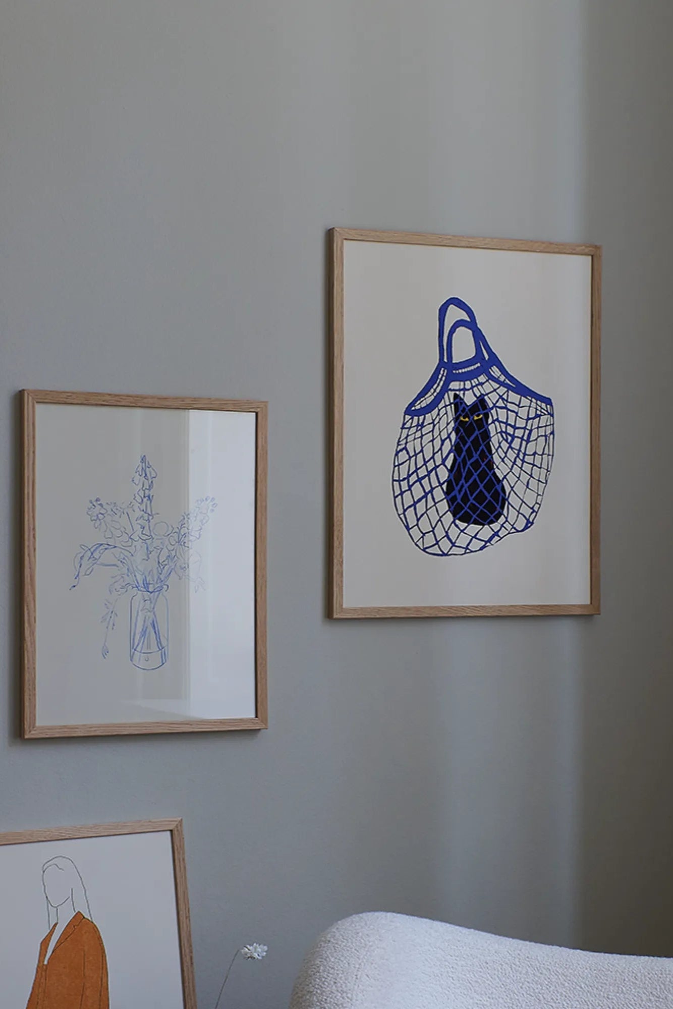 A happy cat peeking out of The Cat’s In The Bag and enjoying the comfortable space