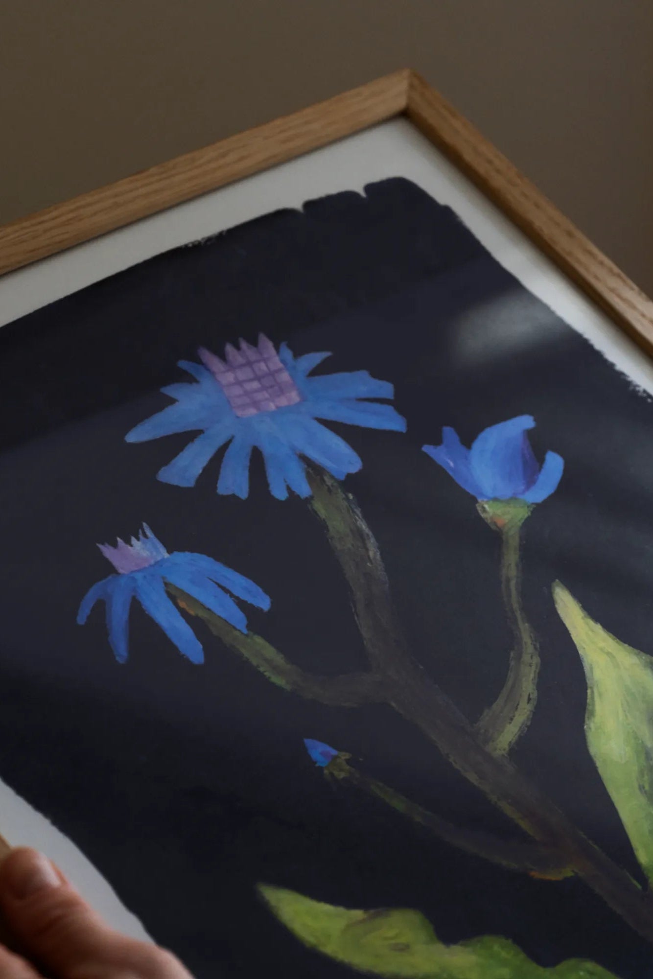 Close-up of Night Flower perfume being sprayed on a woman's wrist