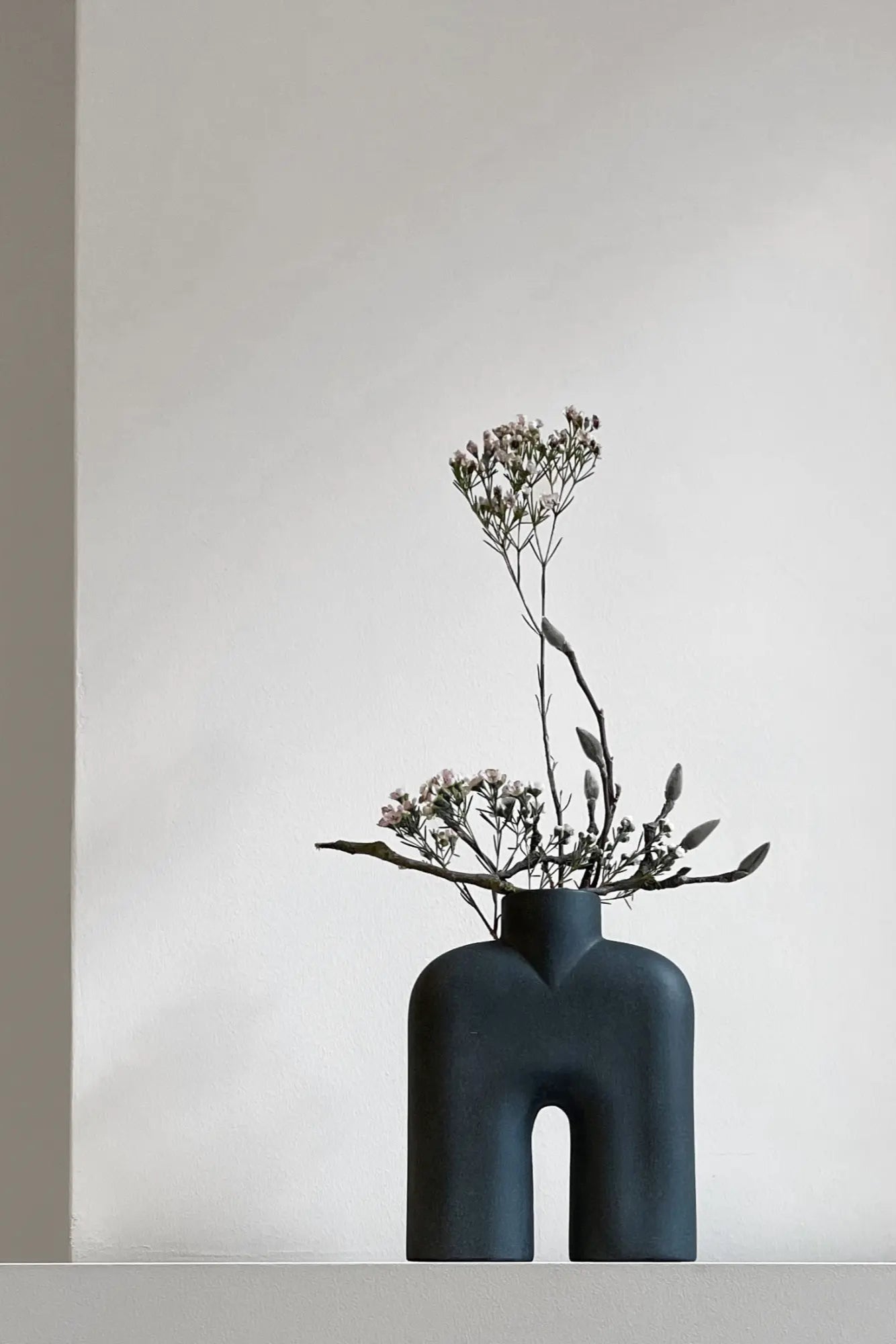 Handcrafted ceramic tall Cobra vase in mini size, perfect for elegant floral arrangements