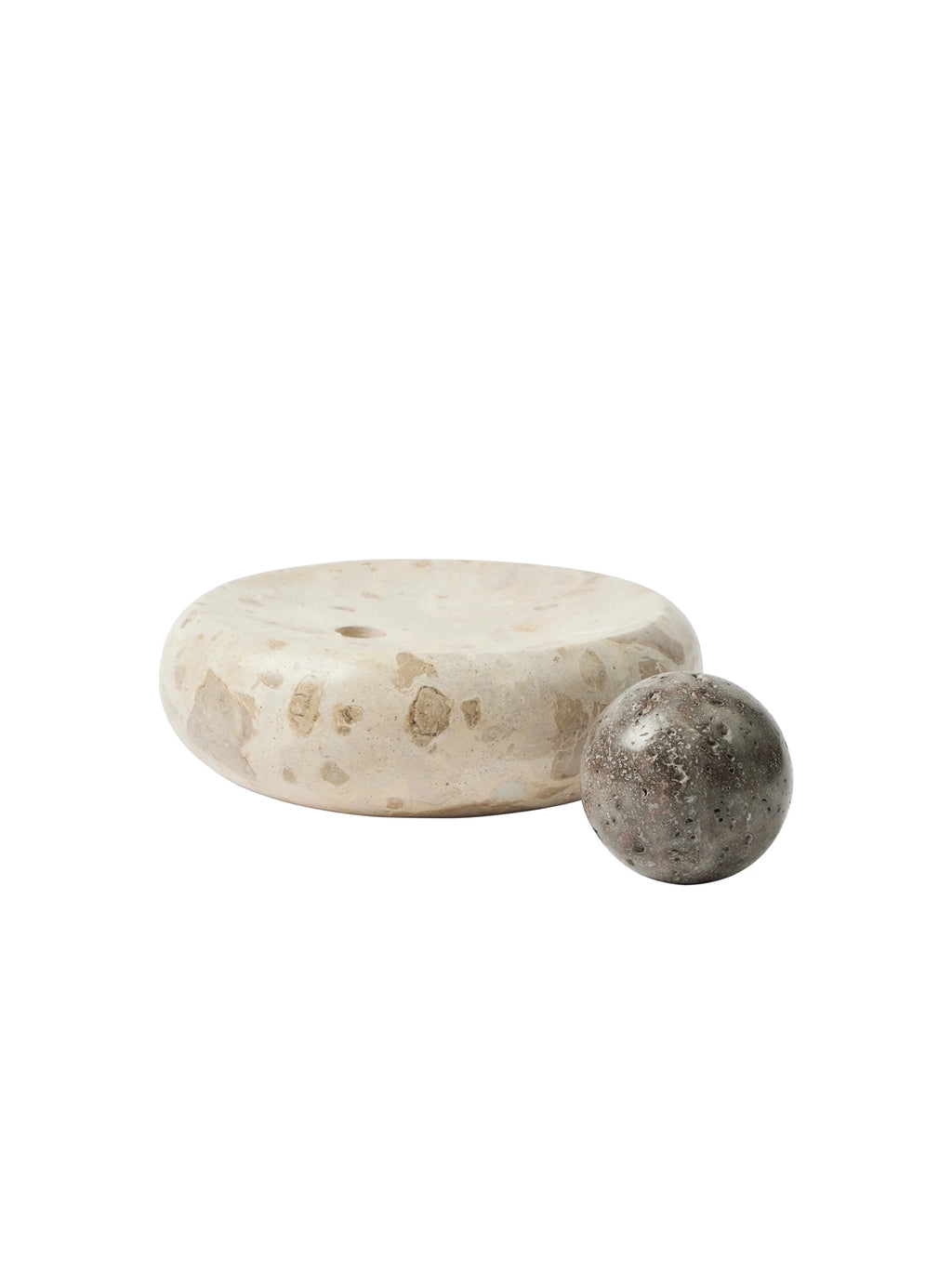 Kristina Dam Coherent Candle Sculpture, a two-piece organic modern candle holder crafted from naturally textured porous stone.
