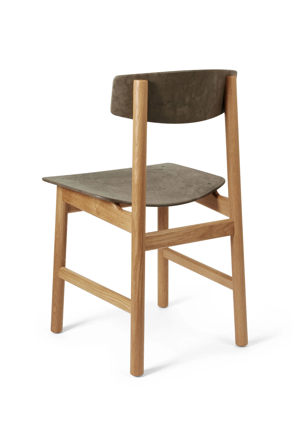 Mater Conscious Chair, shown from a rear-side angle, featuring a natural light oak frame and a dark grey, textured seat and backrest, highlighting its sturdy construction on a white background.